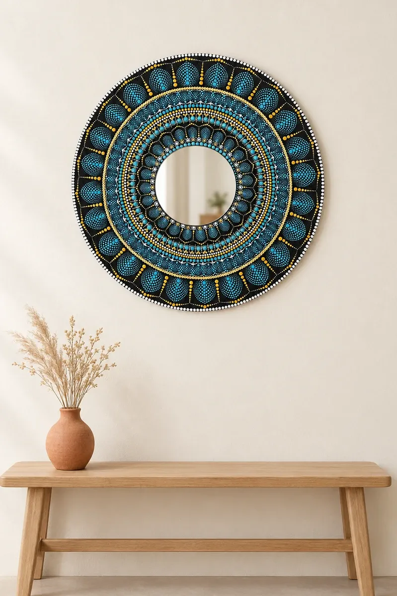 Midnight Petal Mirror, 18 inches, hanging above a wooden bench