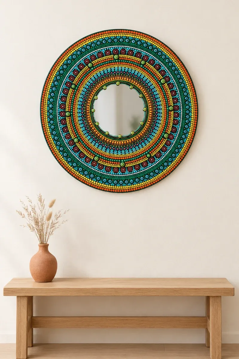 Marigold Mirror, 24 inches, hanging above a wooden bench